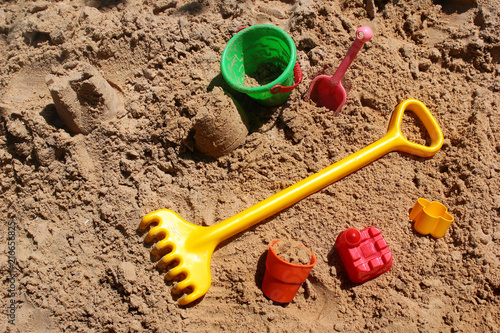Childrens toys in a sandbox
