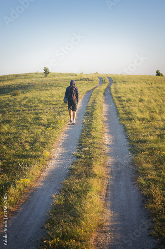 man walking on the road © Andrii Salivon