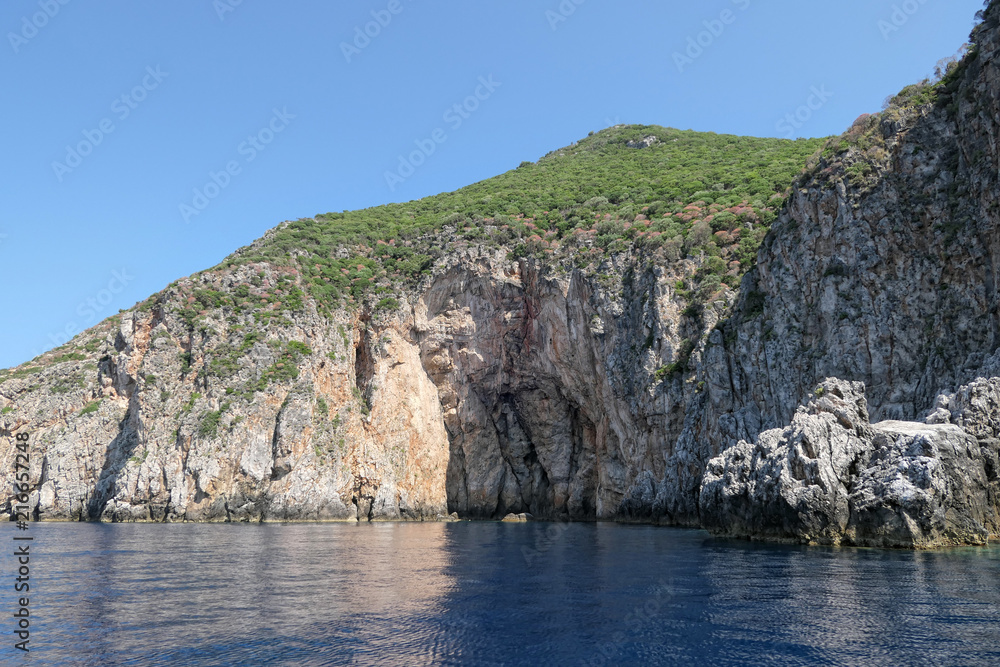 rock formation at paradise beach of Liapades at Corfu Island (Greece). Sedimentary rock cliff of chalk rocks rock formation at paradise beach of Liapades at Corfu Island (Greece). Sedimentary rock cliff of chalk rocks