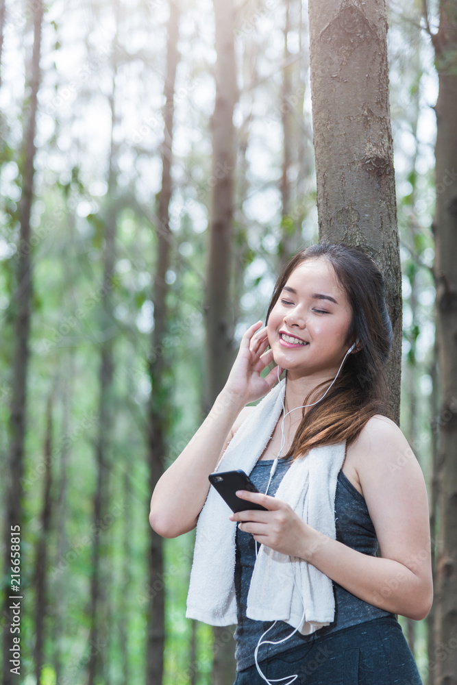 Young sport woman lifestyle using smart phone after running Young sport woman lifestyle using smart phone after running