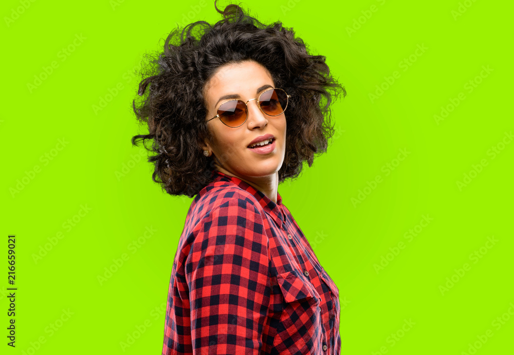 Beautiful arab woman happy and surprised cheering expressing wow gesture Beautiful arab woman happy and surprised cheering expressing wow gesture