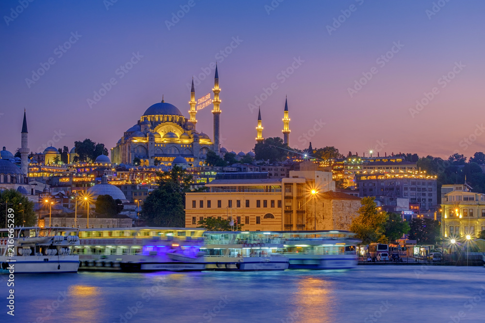 July 20, 2018, Sunset in Istanbul, Turkey. View of the Suleymaniye Mosque and Eminony Pier