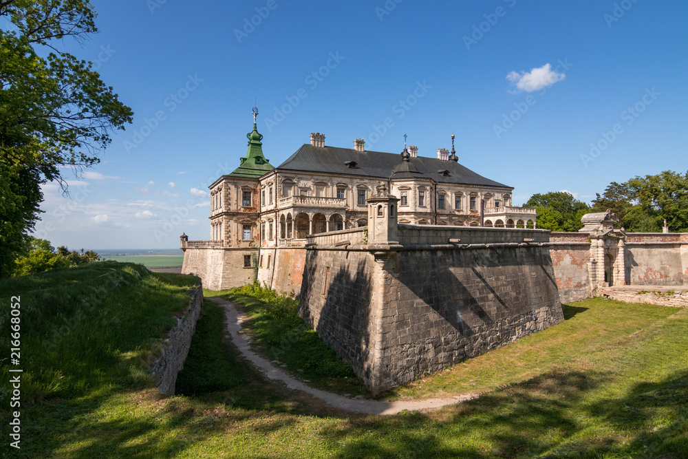 Medieval Pidhirtsi castle at sunny summer day in full view