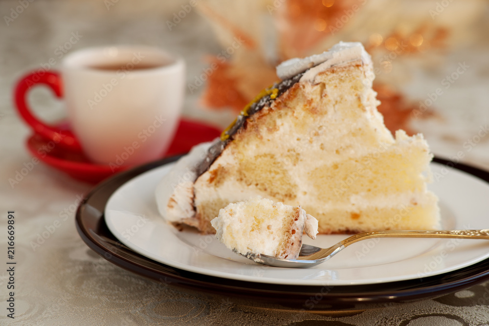 Dessert in a small spoon. A piece of cake in a dessert spoon. Cake on a silk tablecloth. Dessert in the form of a cake with the name of a turtle. A cake, a cup of tea and glare. Dessert in a small spoon. A piece of cake in a dessert spoon. Cake on a silk tablecloth. Dessert in the form of a cake with the name of a turtle. A cake, a cup of tea and glare.