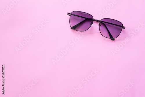 Black glasses , Minimal style layout Leave blank for the text. On a pastel pink background