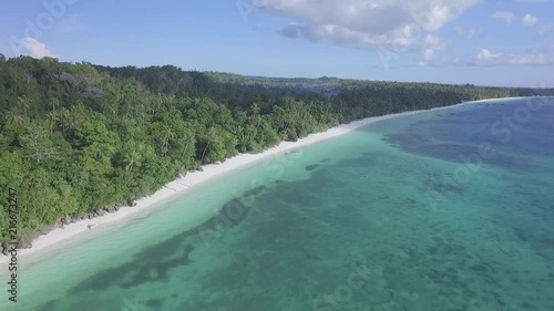 Drone shot of long pristine white sand beach at Kei islands, Indonesia photo