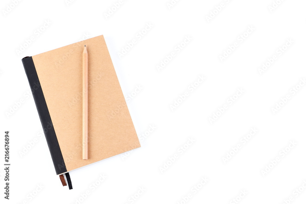 Top view cover note book with cream with pencil placed on white background, space for letter type. Isolated , Copy space. Top view cover note book with cream with pencil placed on white background, space for letter type. Isolated , Copy space.