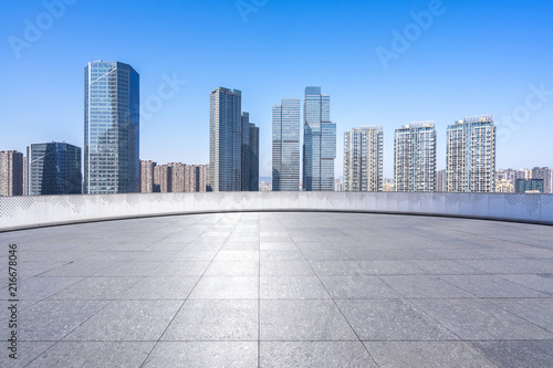 city skyline with empty square © THINK b