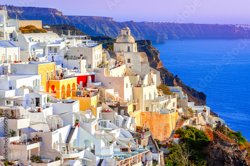 Fira, Santorini island, Greece: Traditional and famous white houses over the Caldera, Aegean sea.