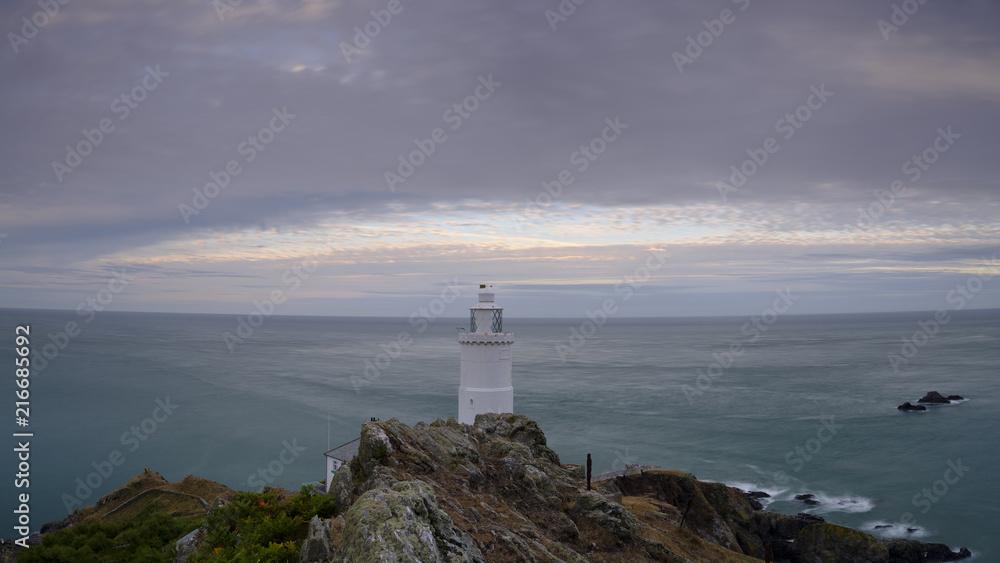 Naklejka premium Summer sunset on Start Point Light in Devon, UK