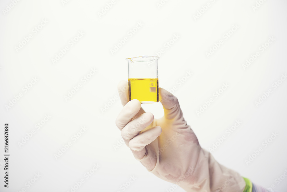 Chemical liquid in glassware of science lab on white background Chemical liquid in glassware of science lab on white background