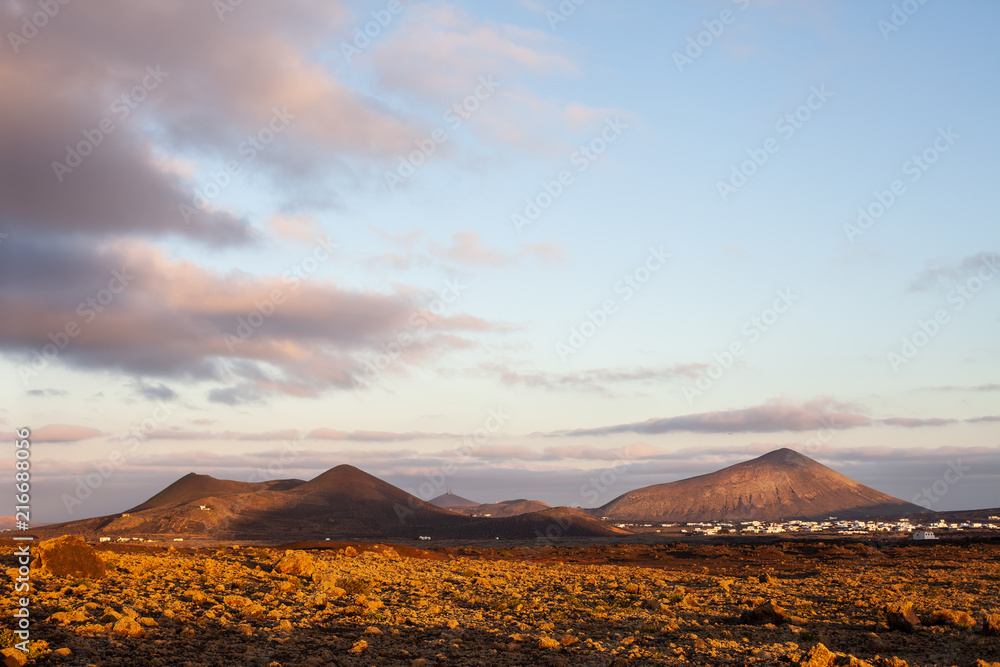 Sunset over unique Lanzarote island landscape Sunset over unique Lanzarote island landscape