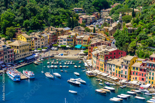 Fotografie Portofino, Italy - colorful houses and yacht in little bay harbor