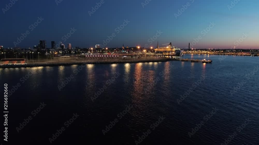 Aerial Shot of Scene with Ship Standing in the Port on the Night. Aerial Shot of Scene with Ship Standing in the Port on the Night.