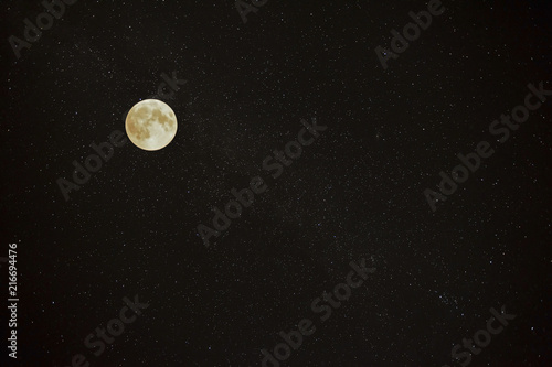 beautiful full moon on the background  night starry sky
