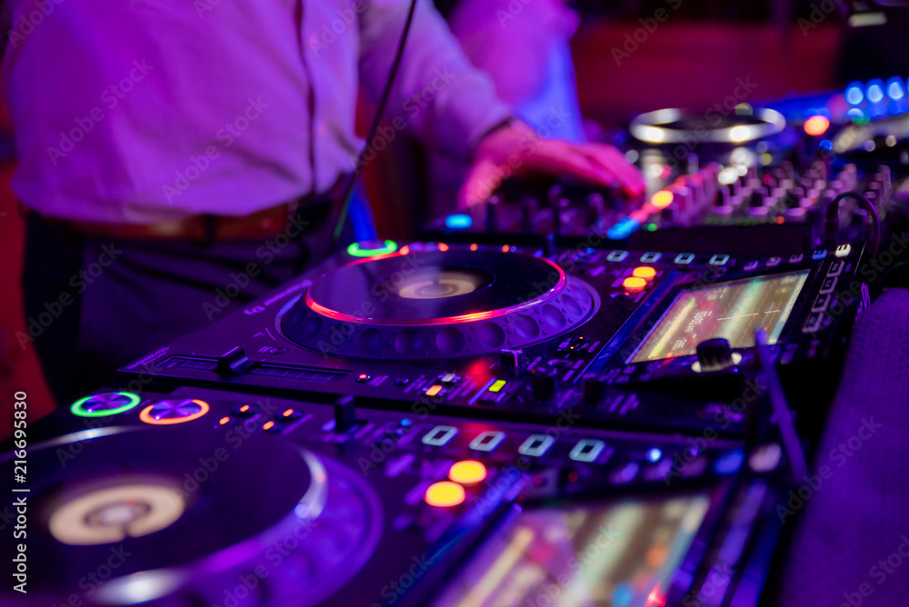 Obraz premium Professional sound mixer for musical events. hand of the DJ operator