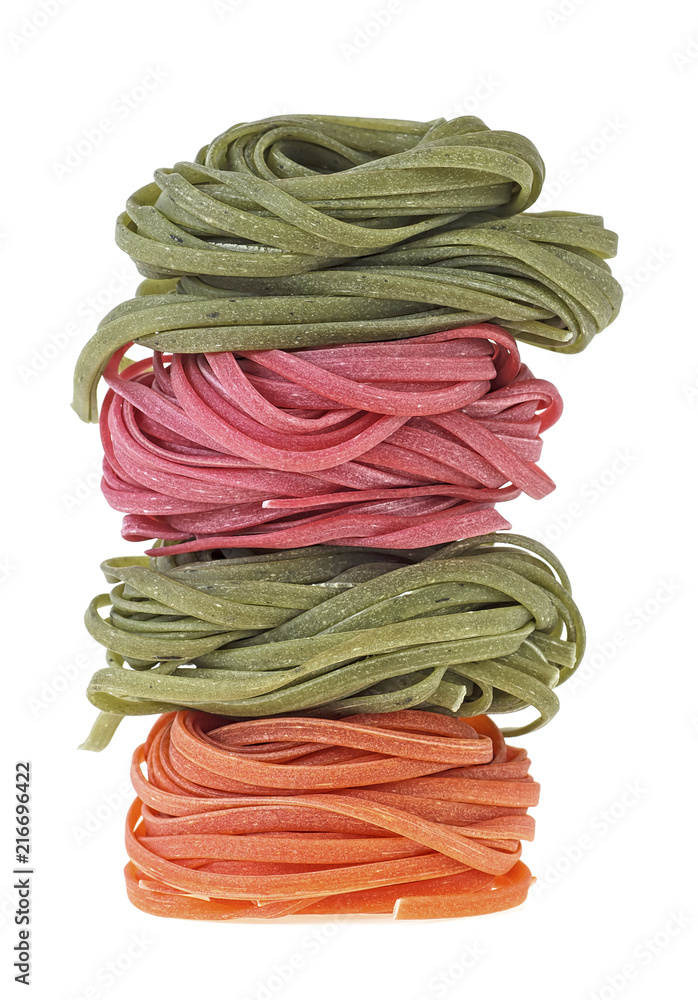 Colorful pasta tagliatelle on a white background