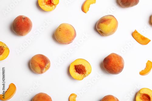 Fototapeta Naklejka Na Ścianę i Meble -  Composition with fresh sweet peaches on white background