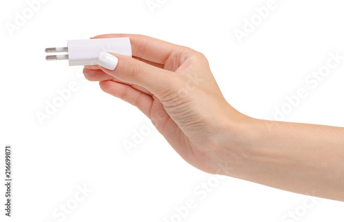 Phone power supply white in hand on white background isolation