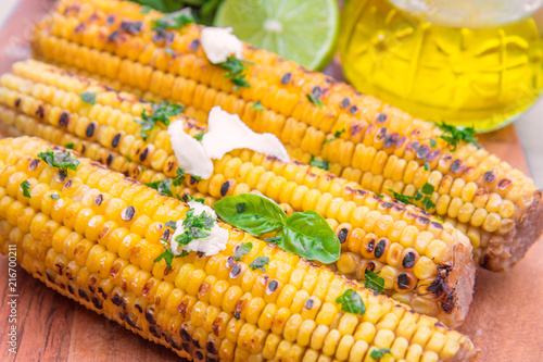 delicious grilled corn with salt and parsley