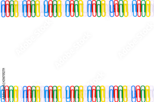 Colored paper clips in a line.