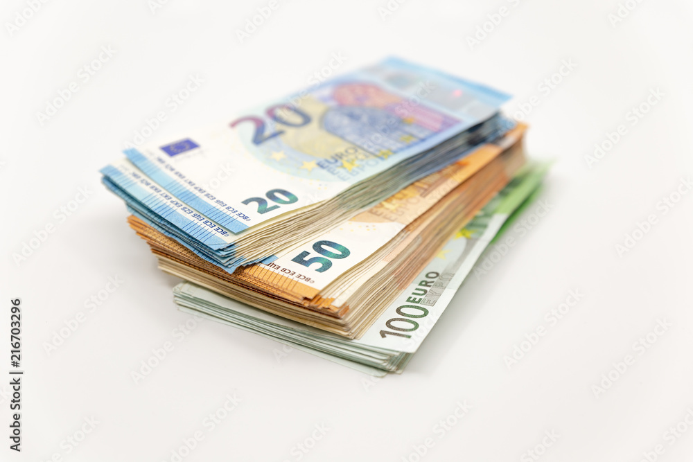 Pile of Euro Banknotes, isolated close-up on white background Pile of Euro Banknotes, isolated close-up on white background