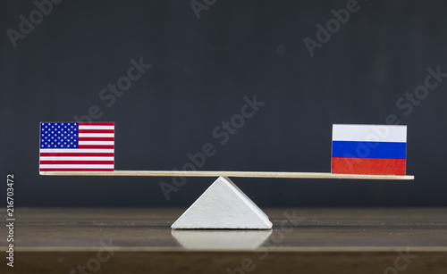 United States of America and Russia Flag Seesaw or Scale in Balance photo