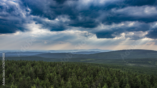 The mountains landscape. View from the rock hill to landscape. Amazing and dramatic clouds and sky.
