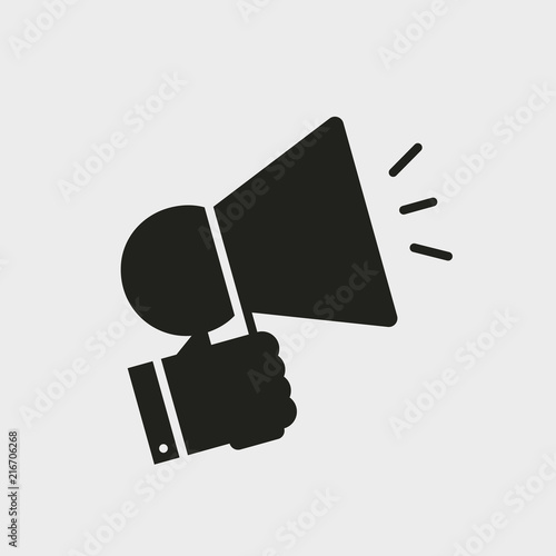 Hand holding megaphone icon. Advertising icon. Glyph icon solid style.