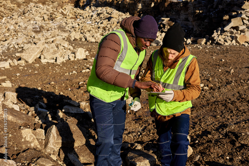 Ταπετσαρία High angle portrait of two industrial workers wearing reflective jackets, one of