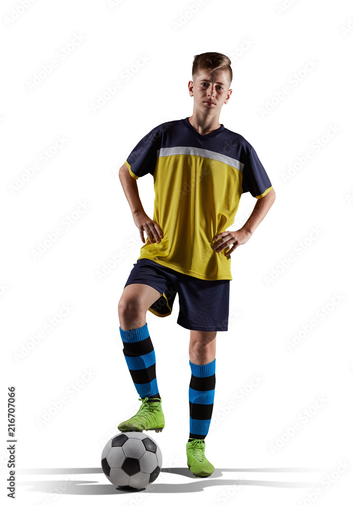 Young soccer player isolated on the white background with soccer ball and shadows