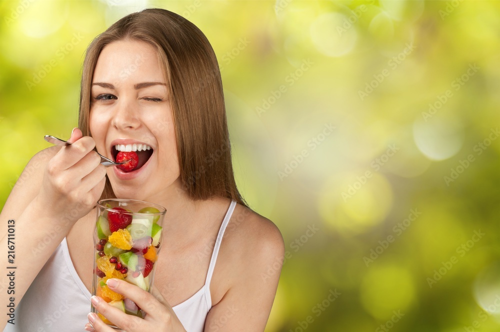 Attractive caucasian woman with fruit salad Attractive caucasian woman with fruit salad