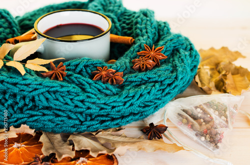 Autumn  fall leaves  hot steaming cup of glint wine