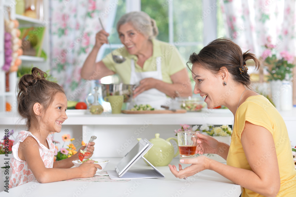 Mother and daughter having breakfast Mother and daughter having breakfast