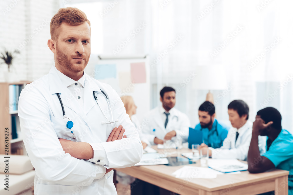 Red-haired Doctor Specialist. Diagnostic Meeting. Red-haired Doctor Specialist. Diagnostic Meeting.