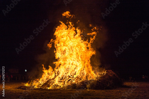 Canvas Print Fire flames with sparks and ember on black background