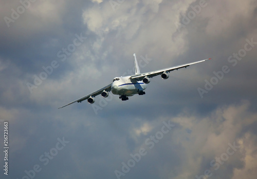 Transport airplane in the summer sky