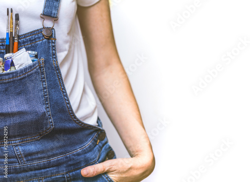 girl painter holds a brush