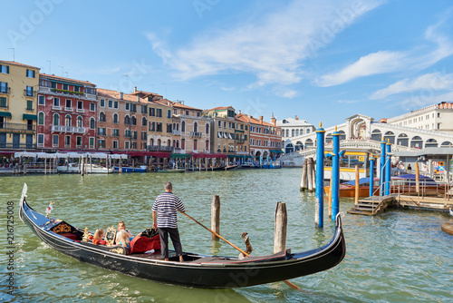 Romantic sommer scene of famous Canal Grande. Colorful panorama with Rialto Bridge. Picturesque cityscape of Venice, Italy, Europe. Traveling concept background. © Trambitski