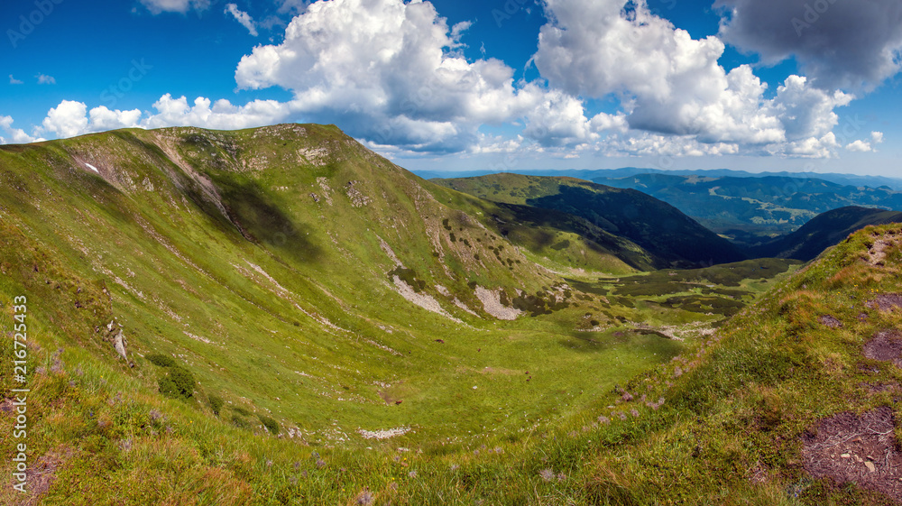 Amazing mountain landscape in vivid sunny day, natural outdoor travel background. Dramatic and picturesque scene of Carpathian mountains in Ukraine. Amazing mountain landscape in vivid sunny day, natural outdoor travel background. Dramatic and picturesque scene of Carpathian mountains in Ukraine.