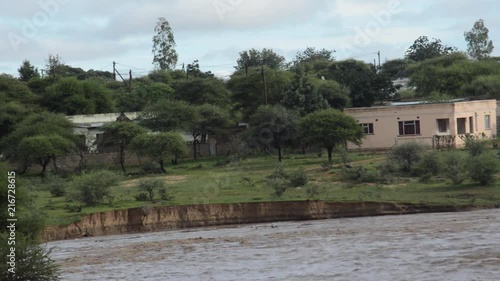 Metsemotlhabe river flowing near a house Full photo