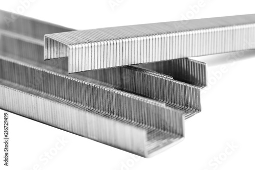 Metal staples for stapler , closeup isolated on white background