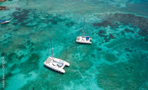 Yachts and boats in the bay. Beautiful bay with turquoise water. View from above