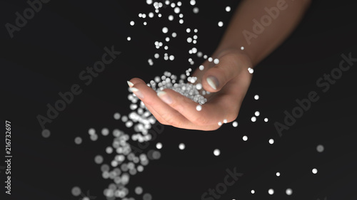 white granules fall into the hand