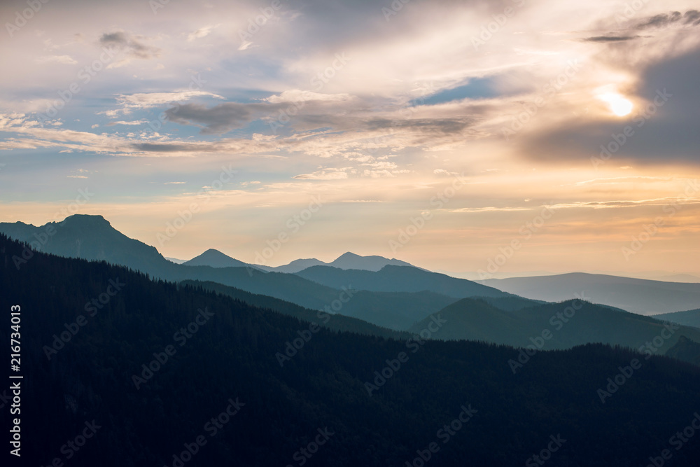 Scenic lanscape view of beautiful mountains on sunset at dusk. Rysy mountains, Hight Tatry, Poland, Slovakia