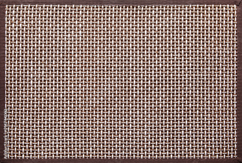 support for a table in restaurant with texture / knitted white and brown decorative background with brown frame
