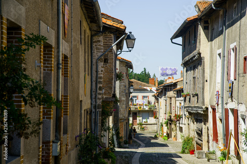 Fototapeta Naklejka Na Ścianę i Meble -  Streets and buildings of medieval french old town in summer on a sunny day