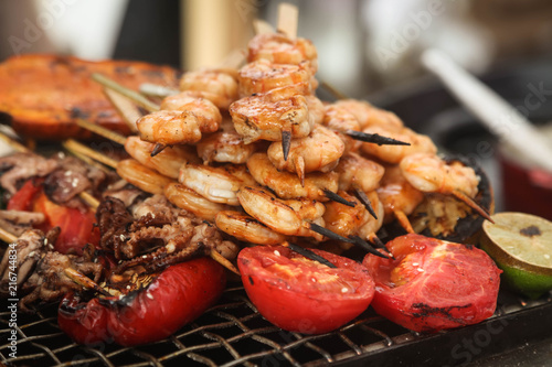shrimp and octopus on grill skewers