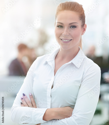 portrait of confident business woman on the background of the office.