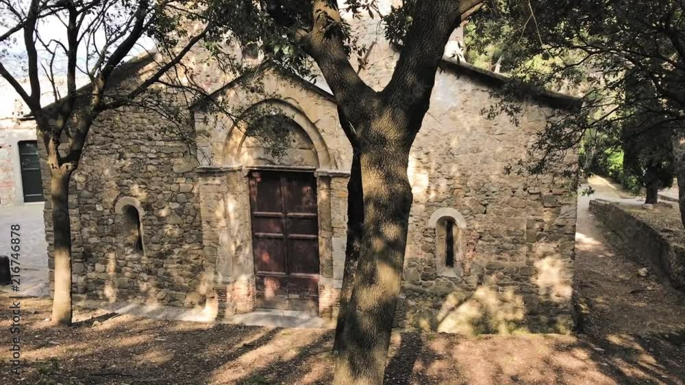 View of an old chapel in an italian village View of an old chapel in an italian village